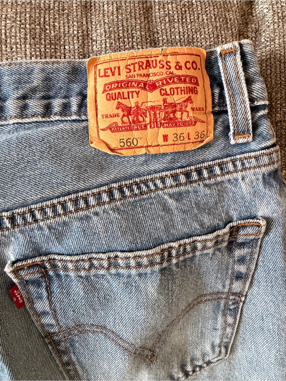 Levi's 560 Relaxed Fit Men's Jeans - Light Blue Denim with Tan Leather Patch